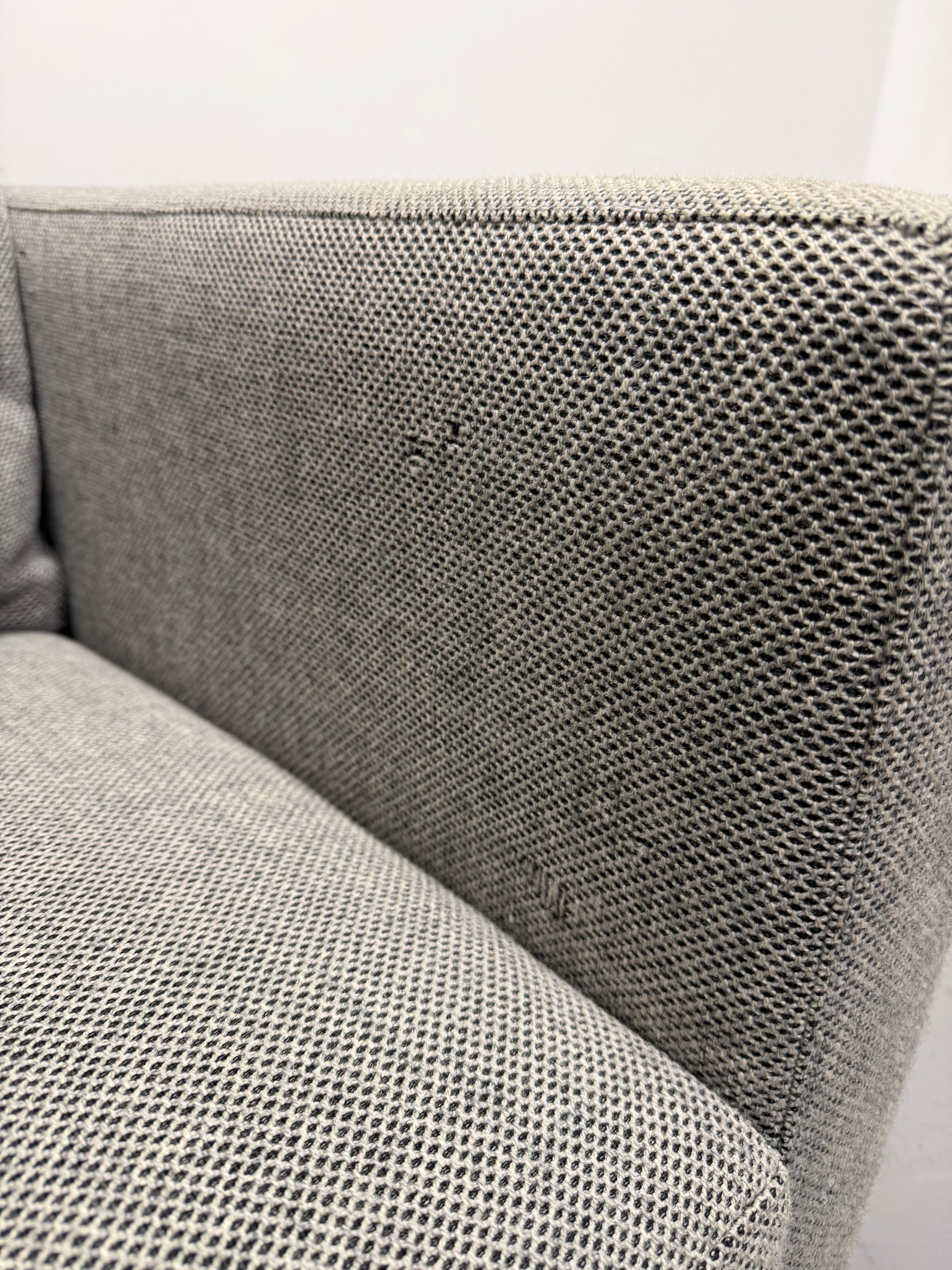 Close-up of a textured gray fabric surface