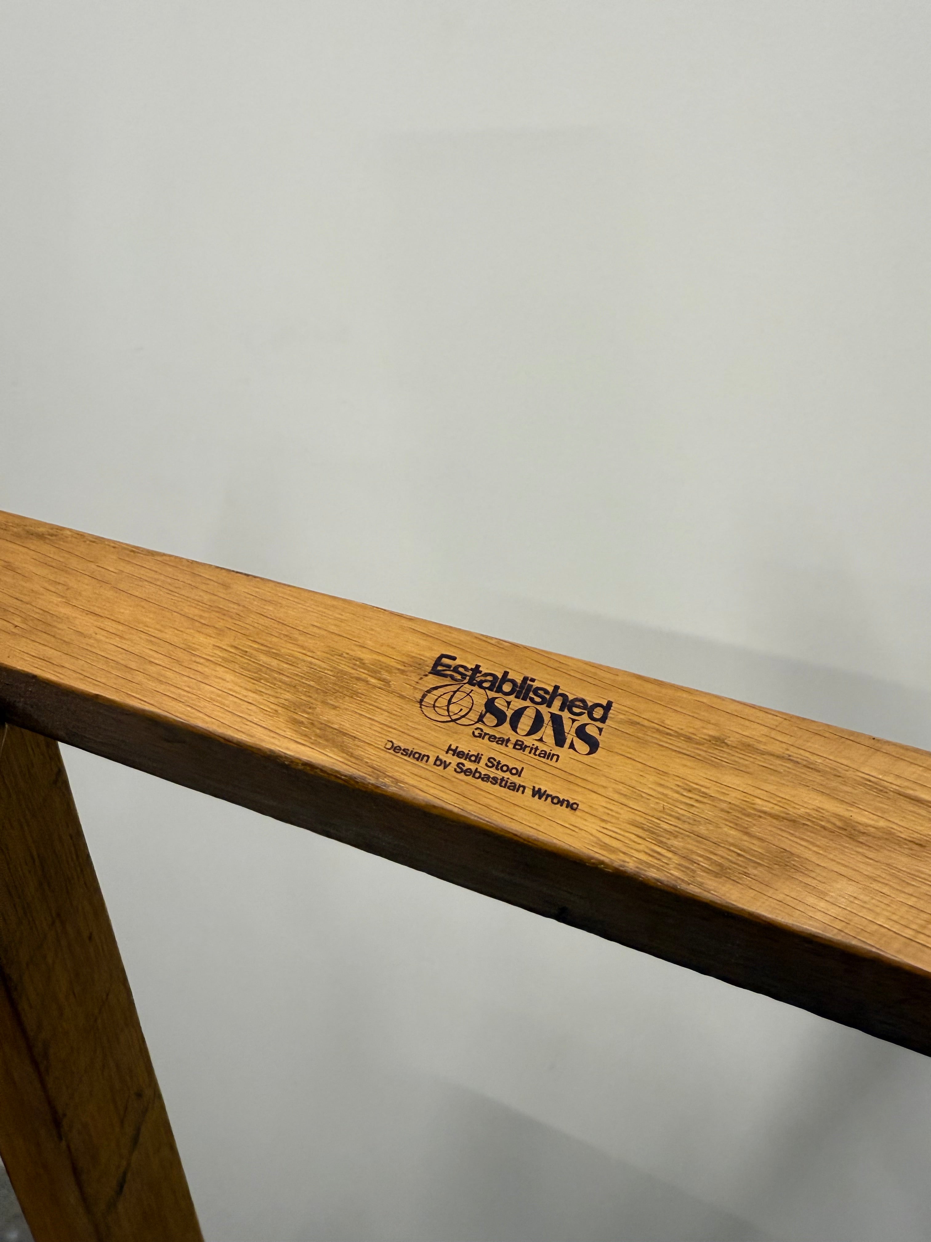 Heidi Bar Stool by Established & Sons – Black Saddle Seat with Solid Oak Base