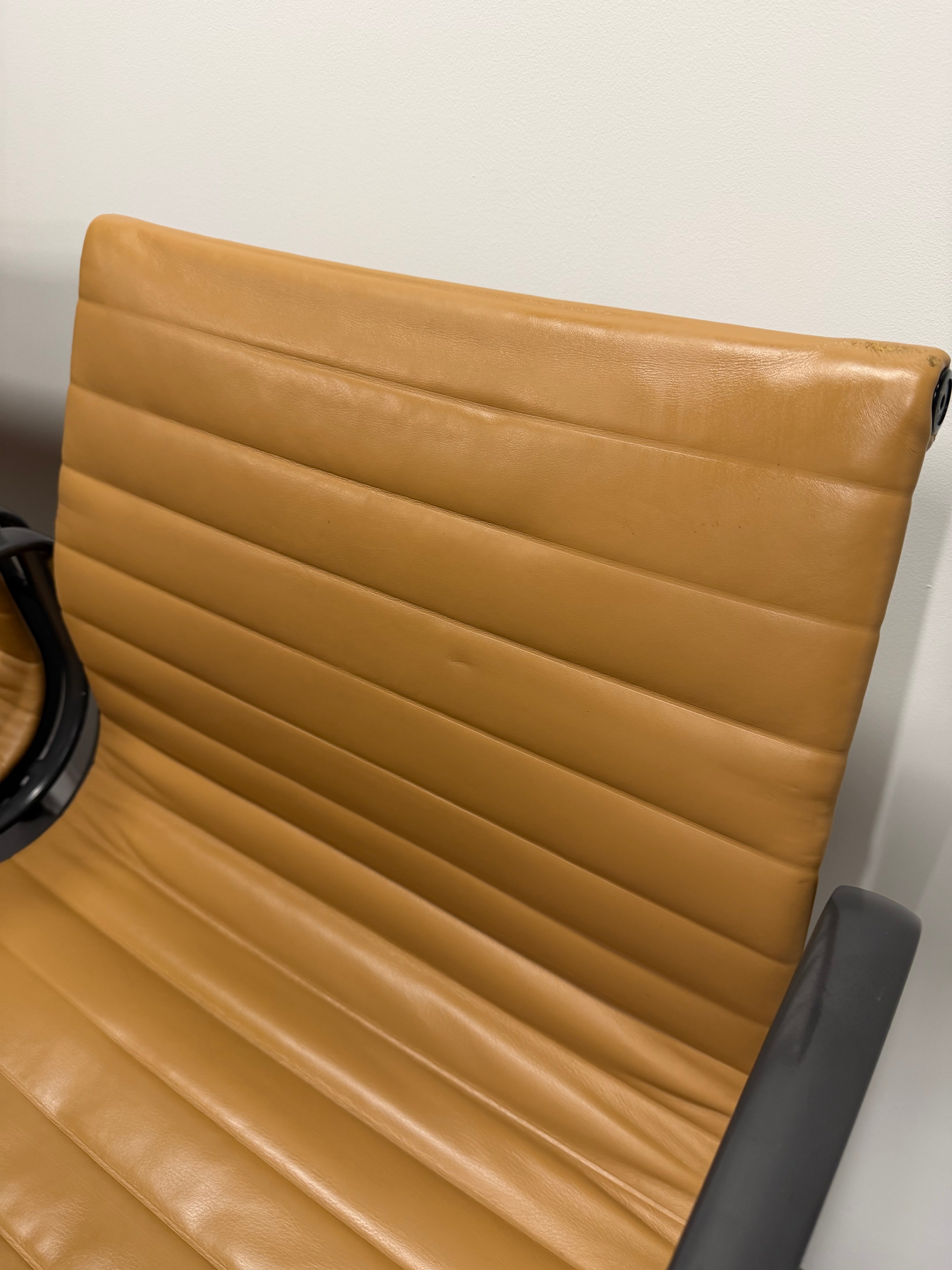 Eames Aluminium Group Low Back Chair - Tan Leather / Black Frame