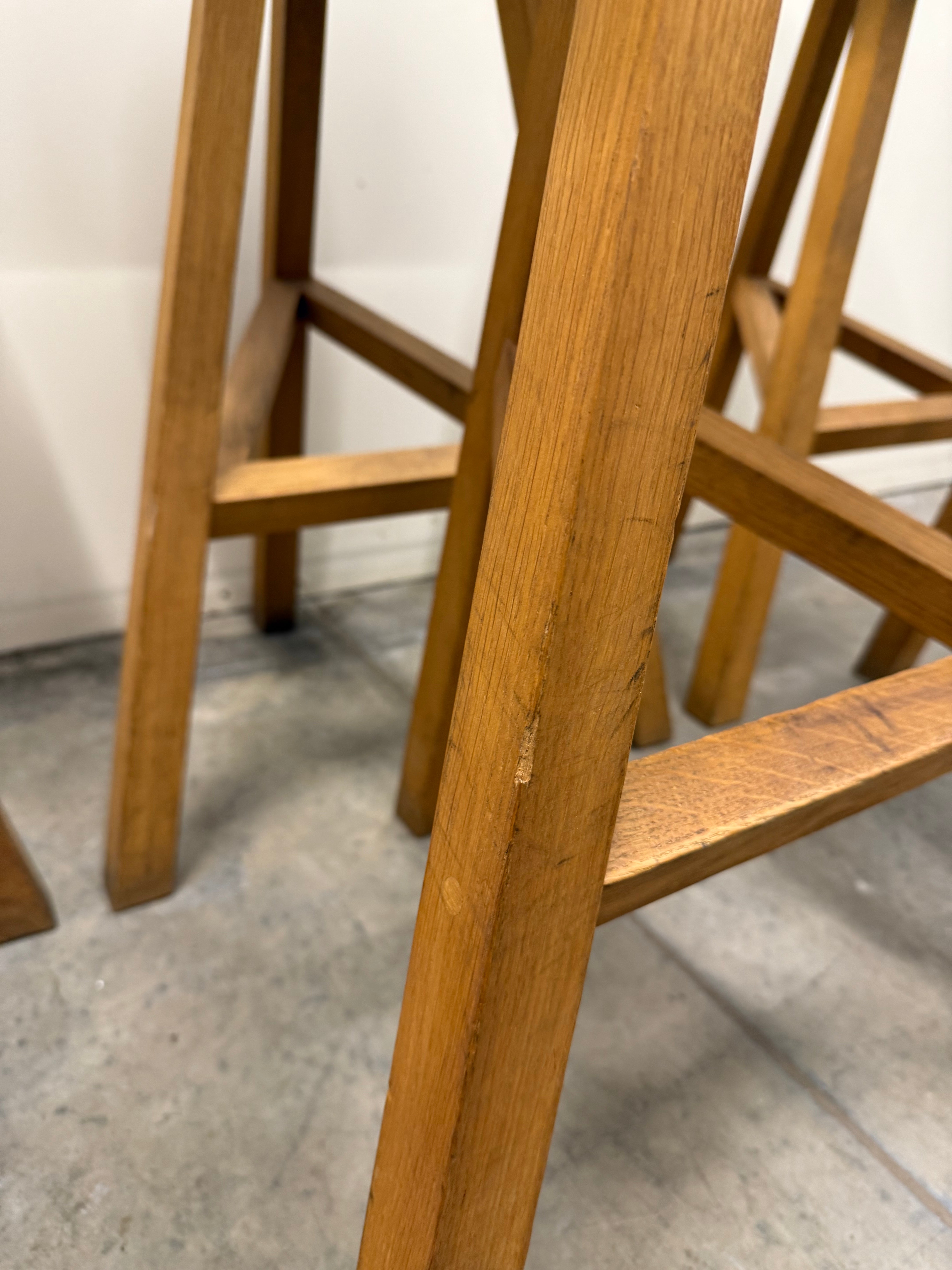 Heidi Bar Stool by Established & Sons – Black Saddle Seat with Solid Oak Base