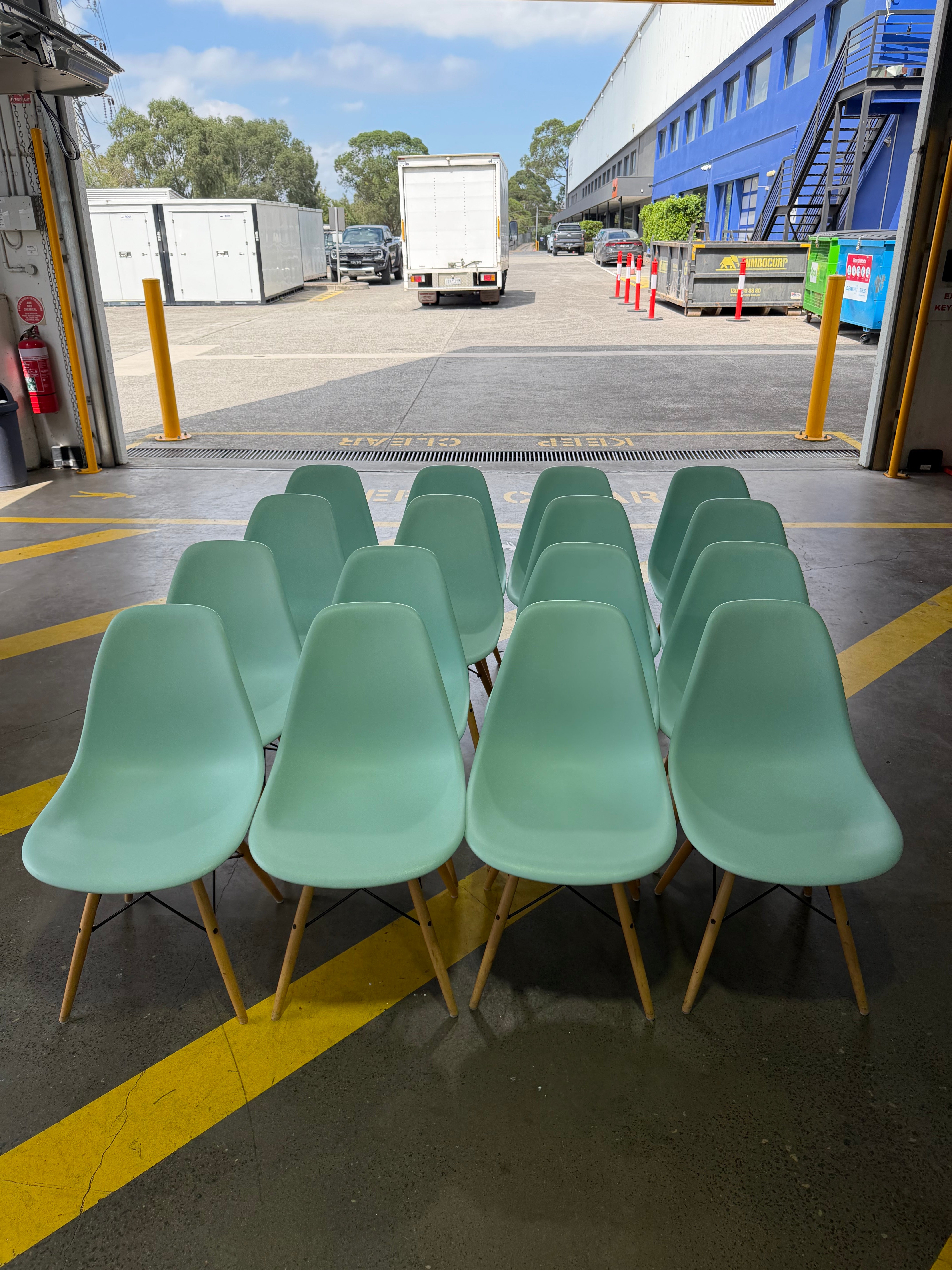 Eames Molded Plastic Side Chair by Herman Miller – Light Blue / Wood Dowel Base