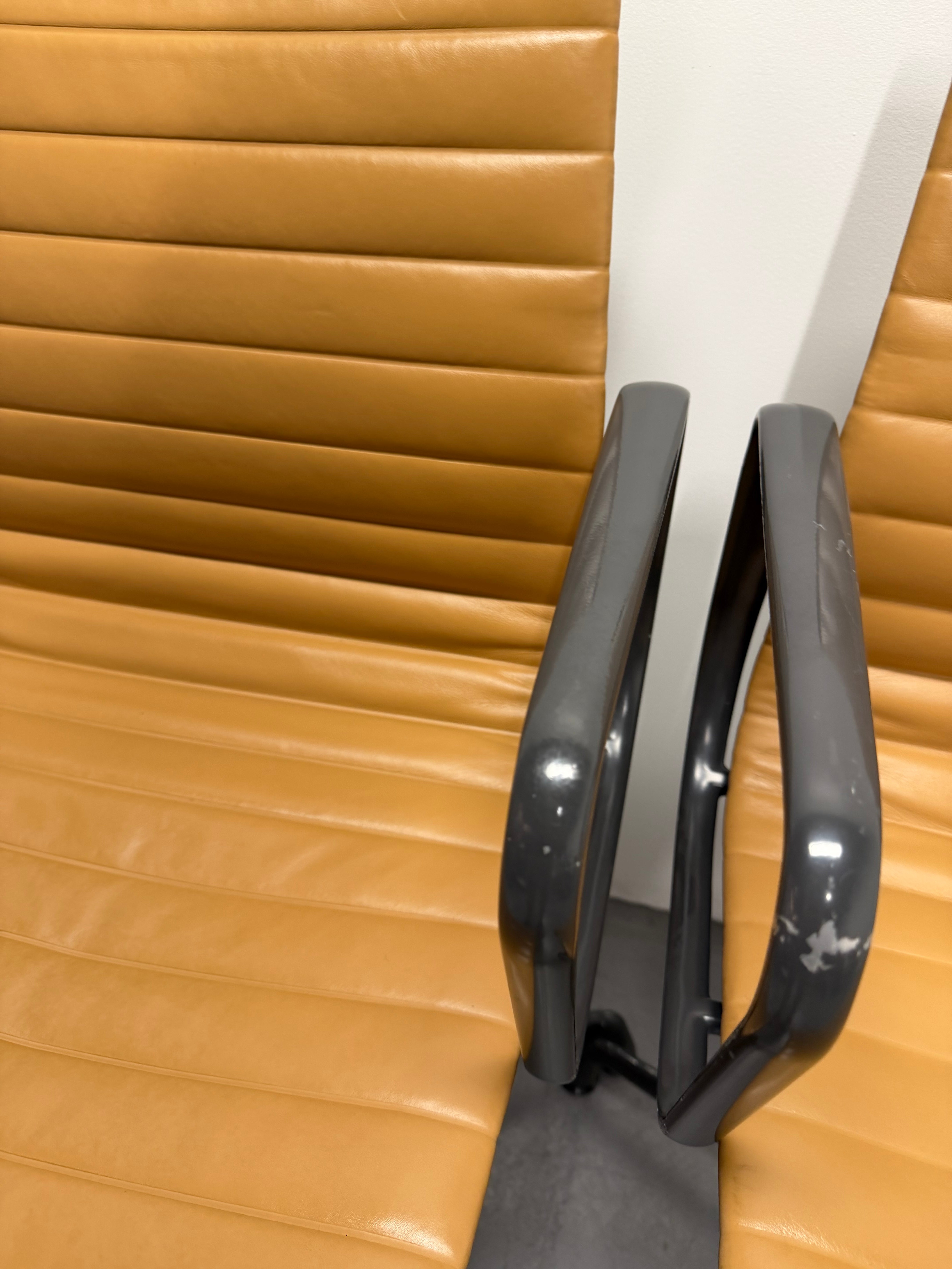 Eames Aluminium Group Low Back Chair - Tan Leather / Black Frame