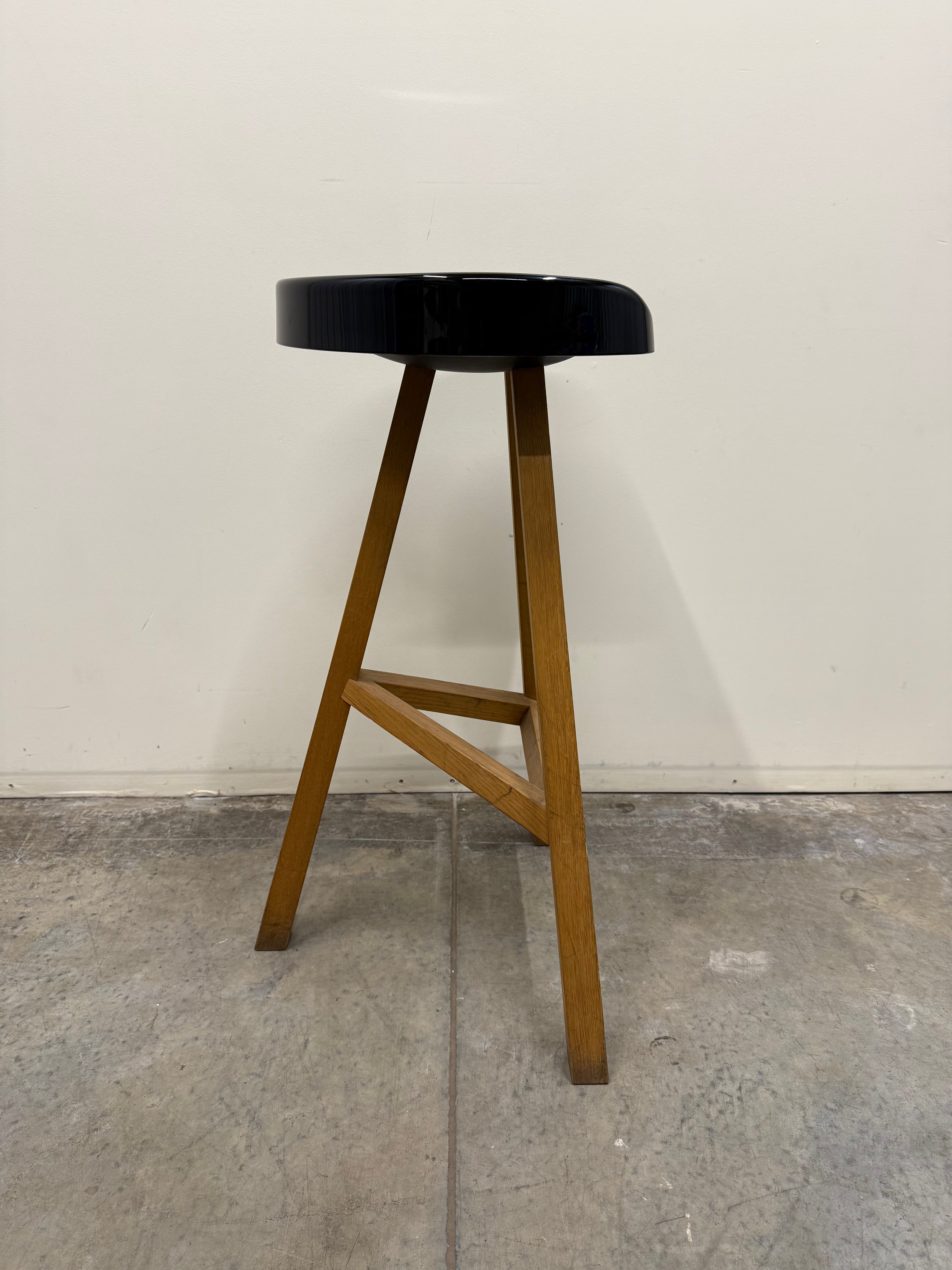 Heidi Bar Stool by Established & Sons – Black Saddle Seat with Solid Oak Base
