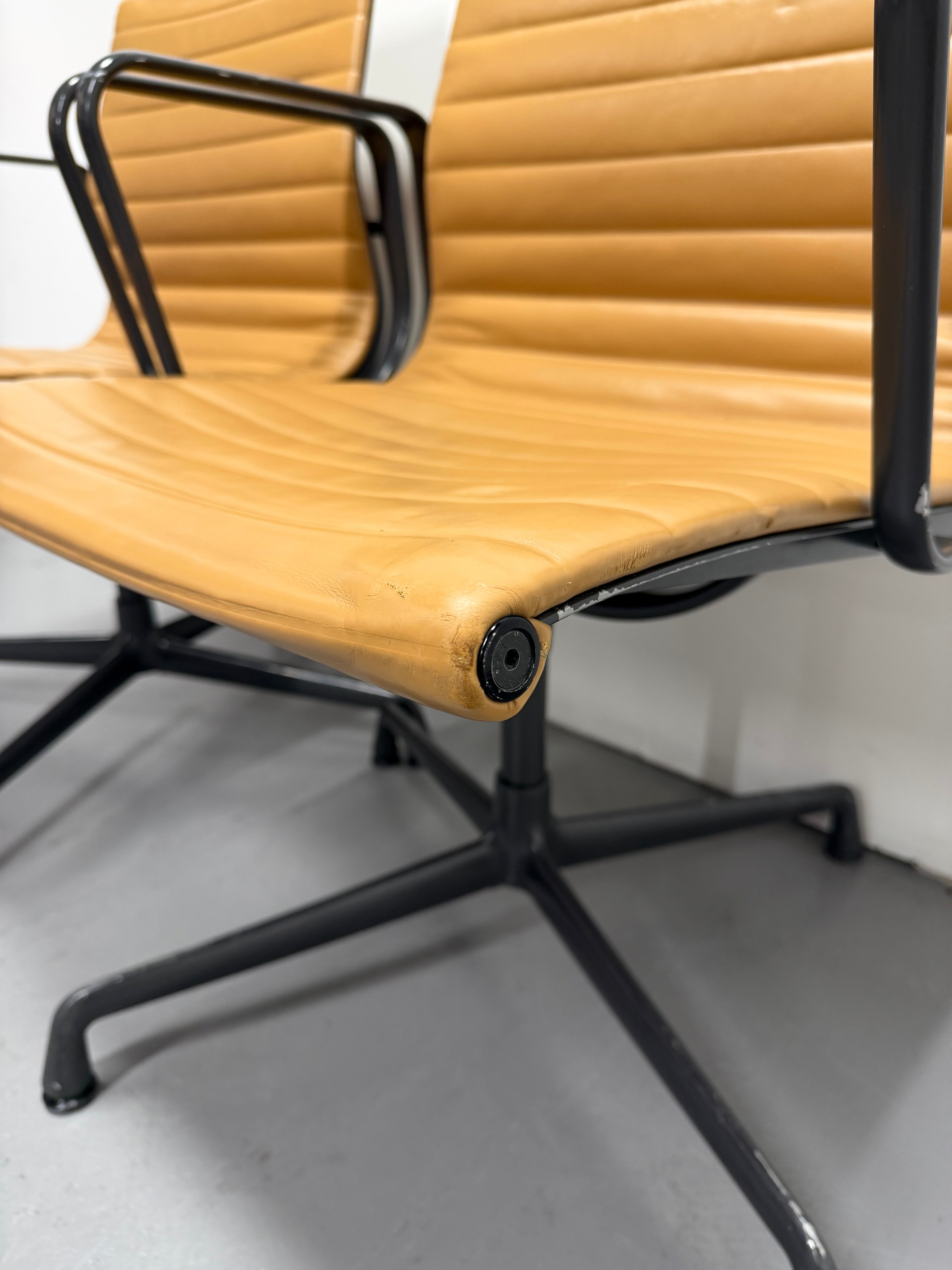 Eames Aluminium Group Low Back Chair - Tan Leather / Black Frame