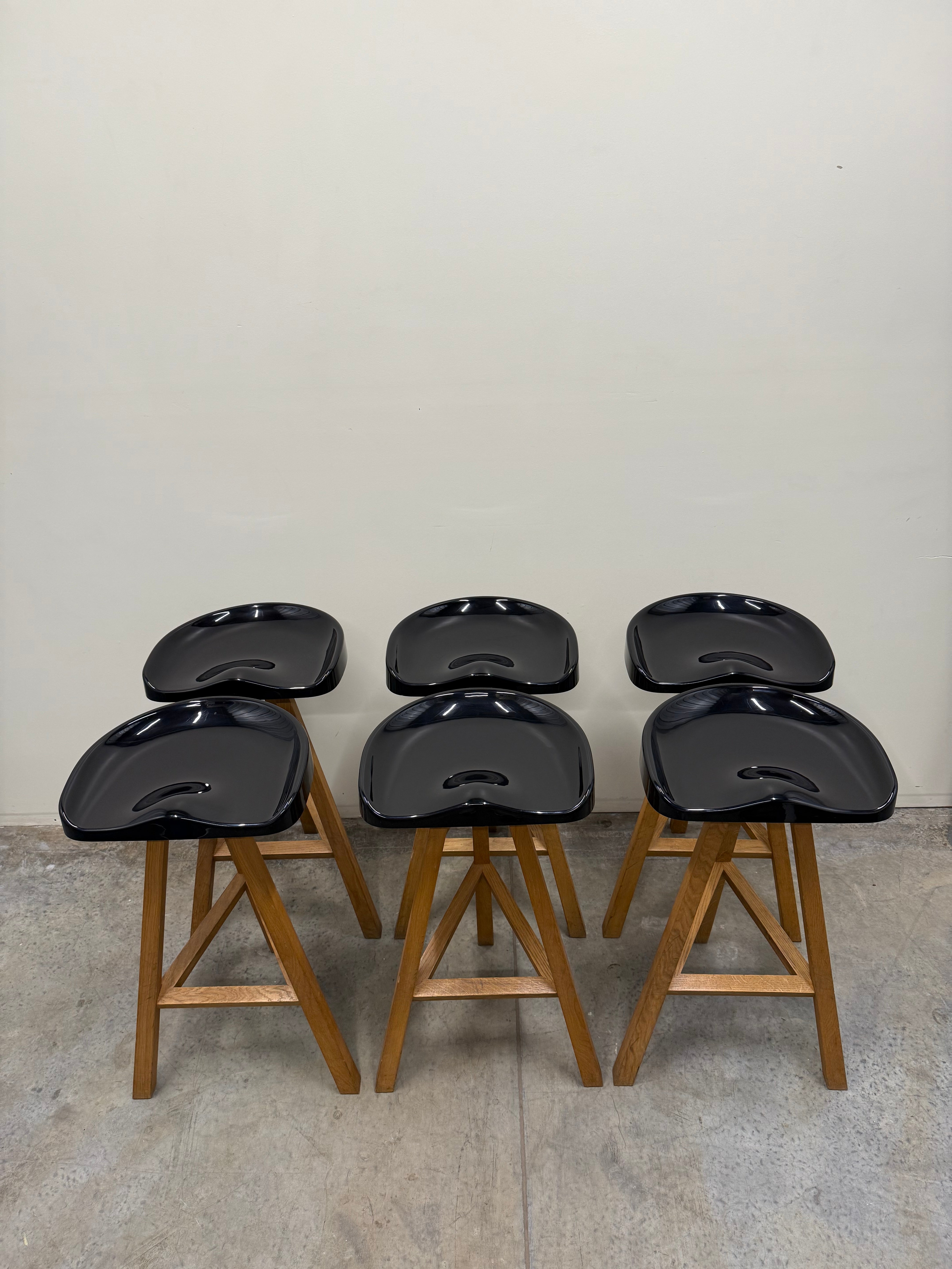 Heidi Bar Stool by Established & Sons – Black Saddle Seat with Solid Oak Base