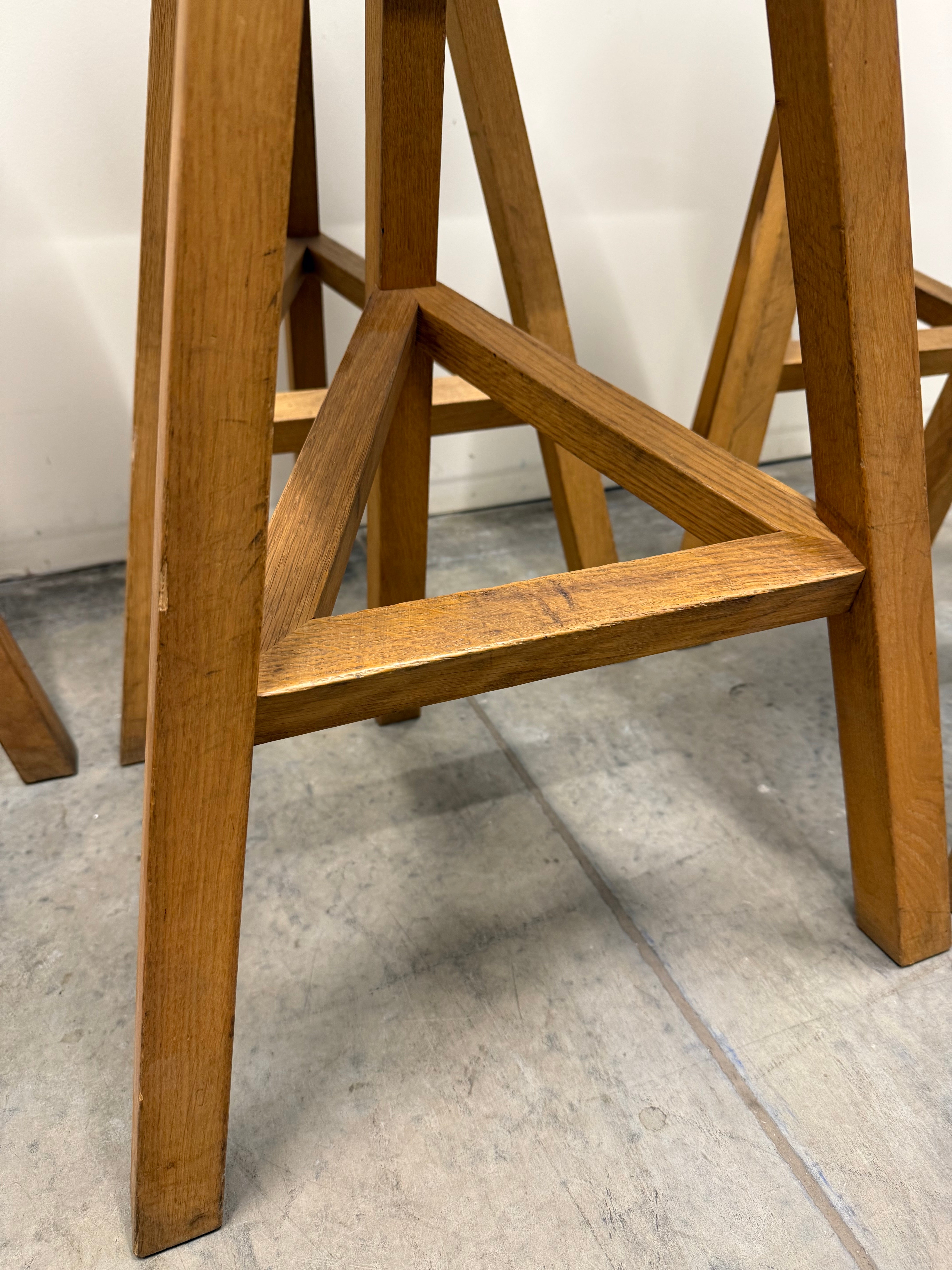 Heidi Bar Stool by Established & Sons – Black Saddle Seat with Solid Oak Base