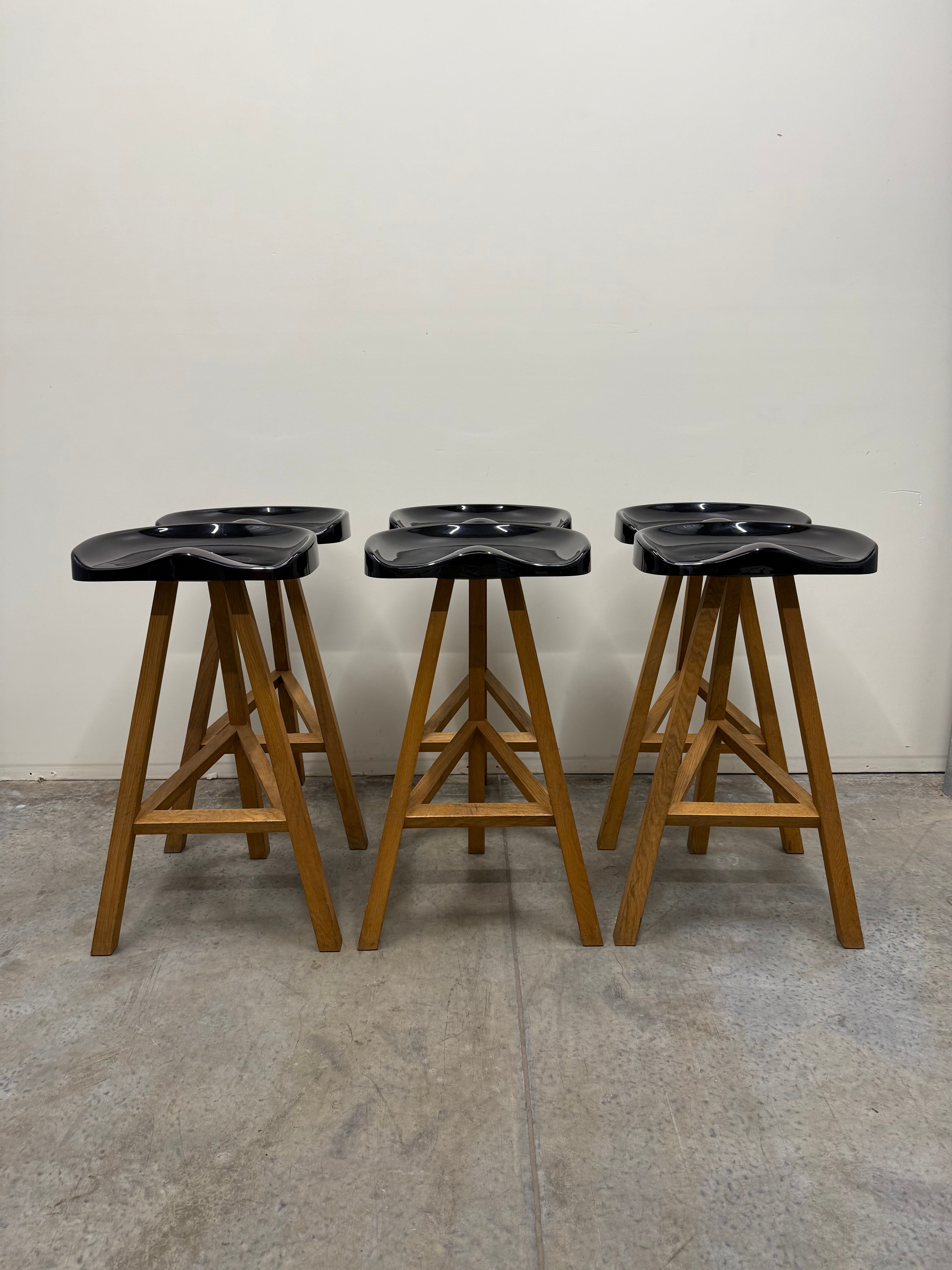 Heidi Bar Stool by Established & Sons – Black Saddle Seat with Solid Oak Base