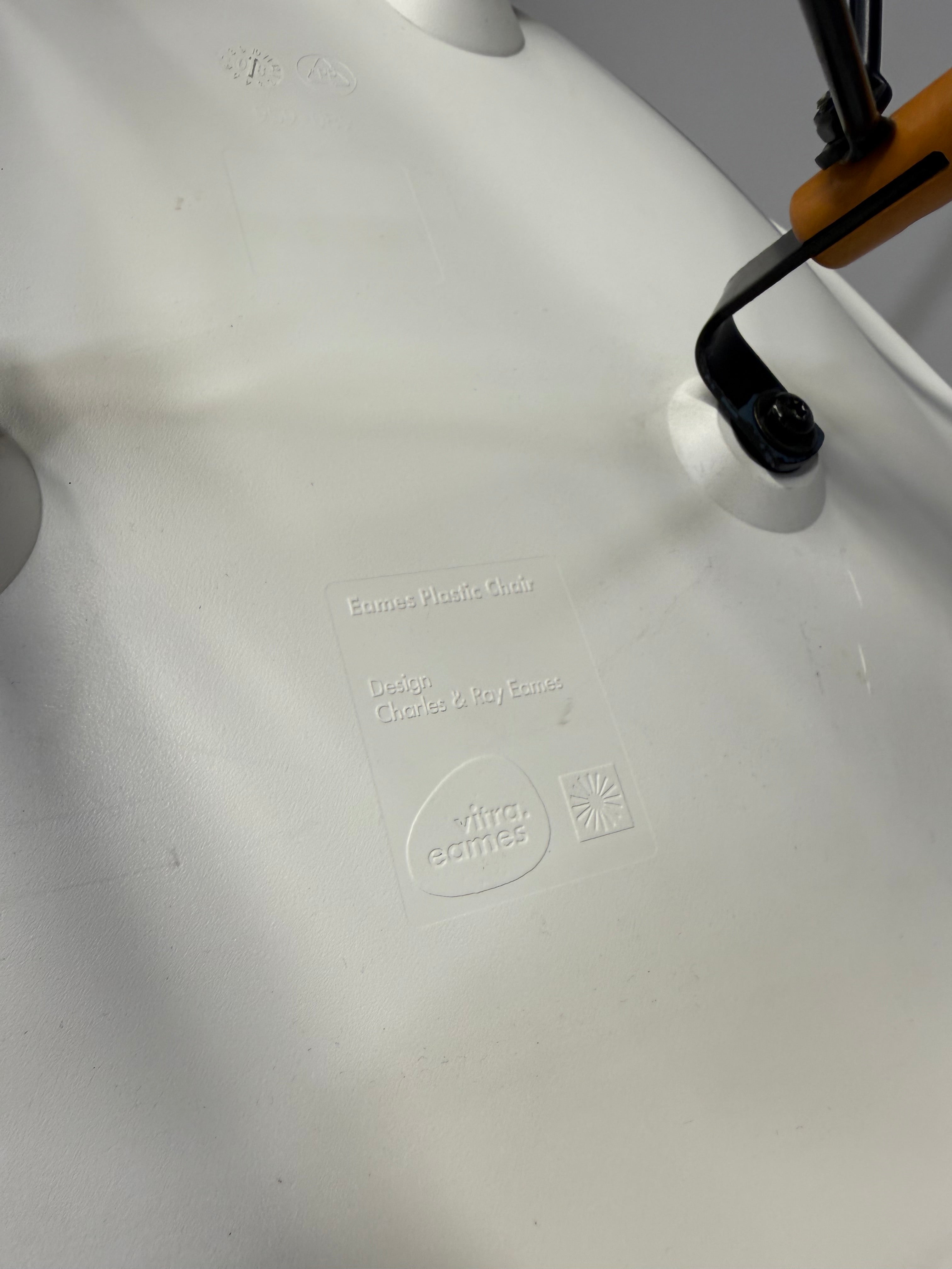 Eames Molded Plastic Side Chair by Herman Miller – White / Wood Dowel Base