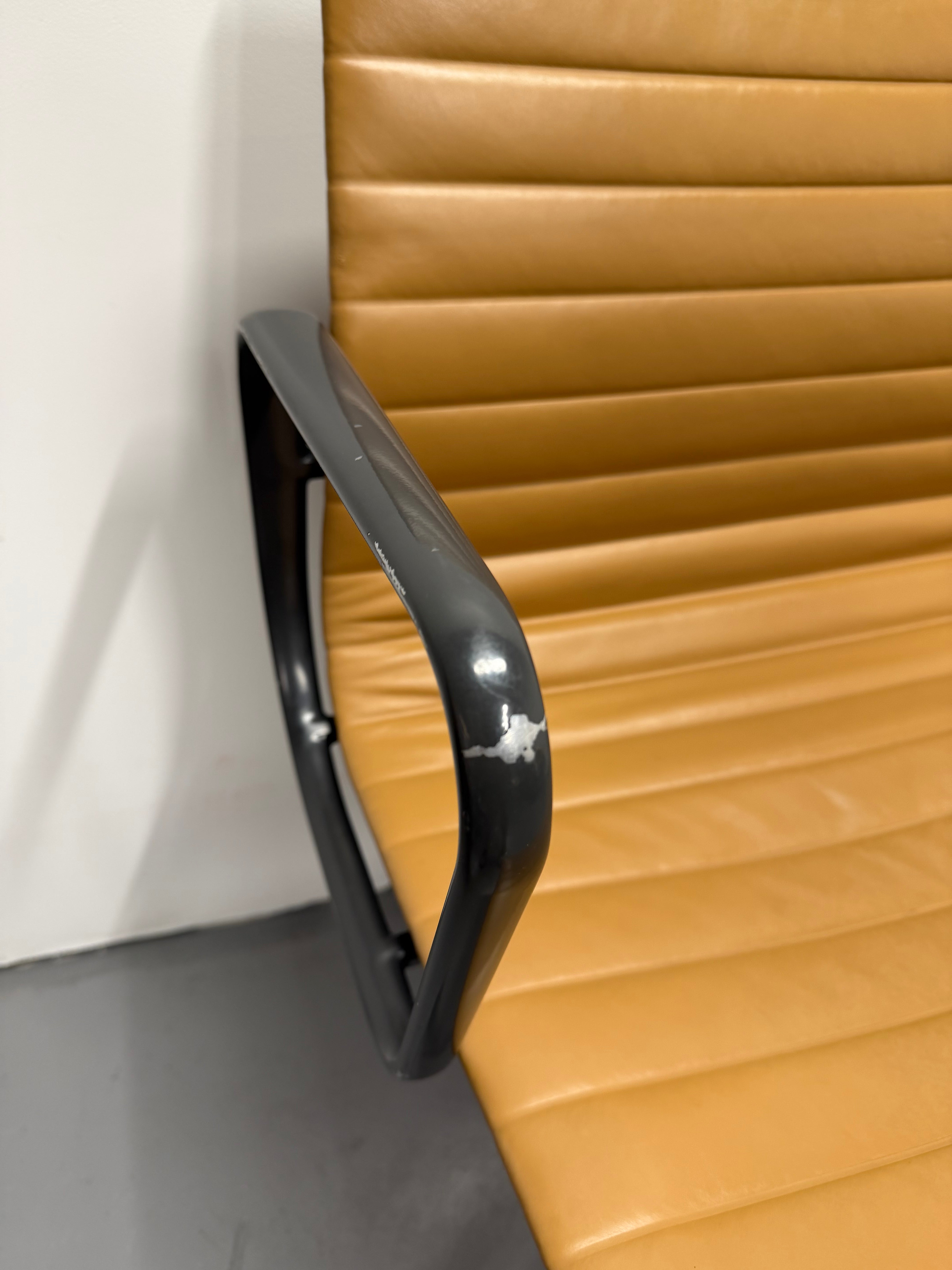 Eames Aluminium Group Low Back Chair - Tan Leather / Black Frame