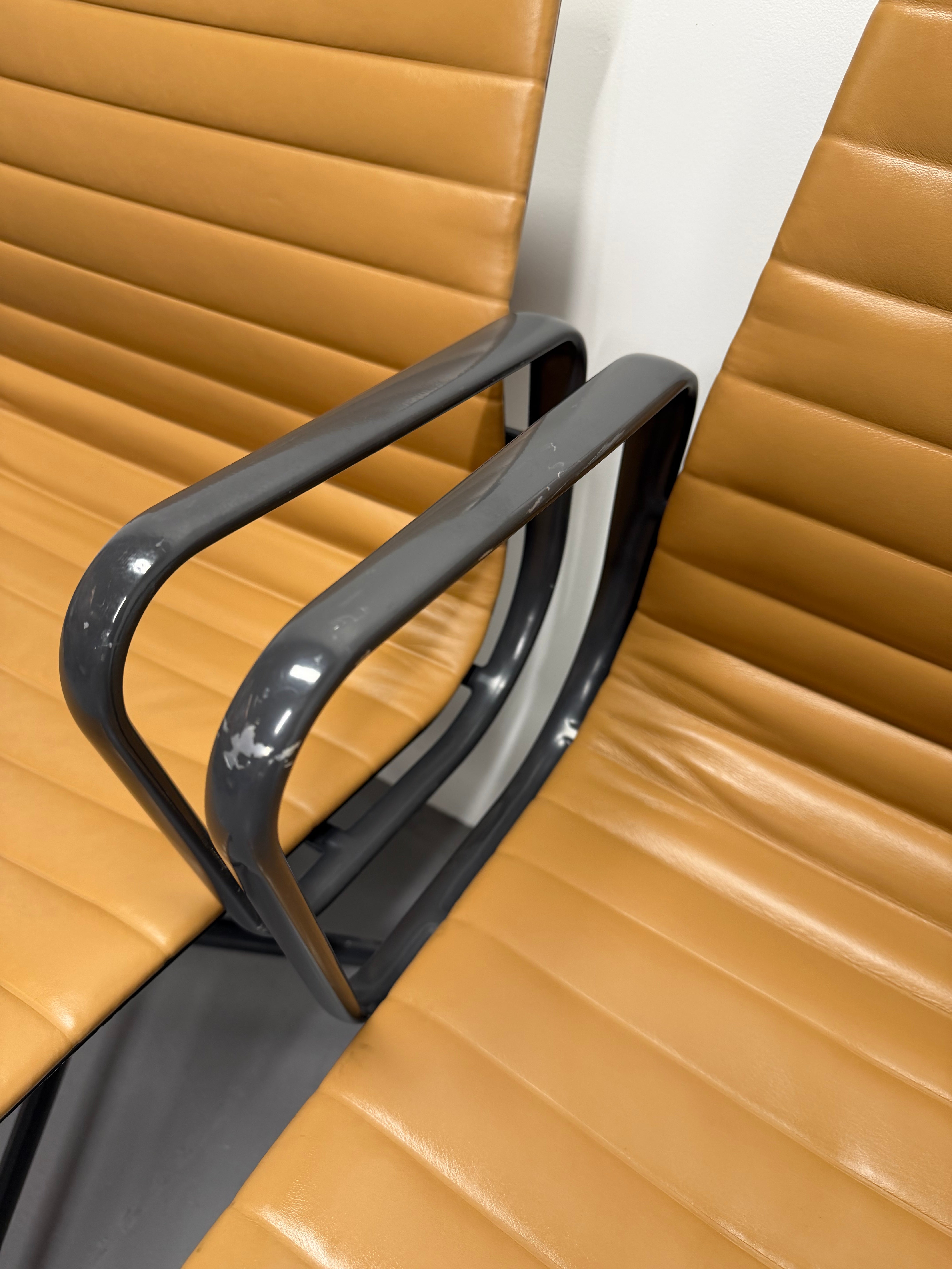 Eames Aluminium Group Low Back Chair - Tan Leather / Black Frame