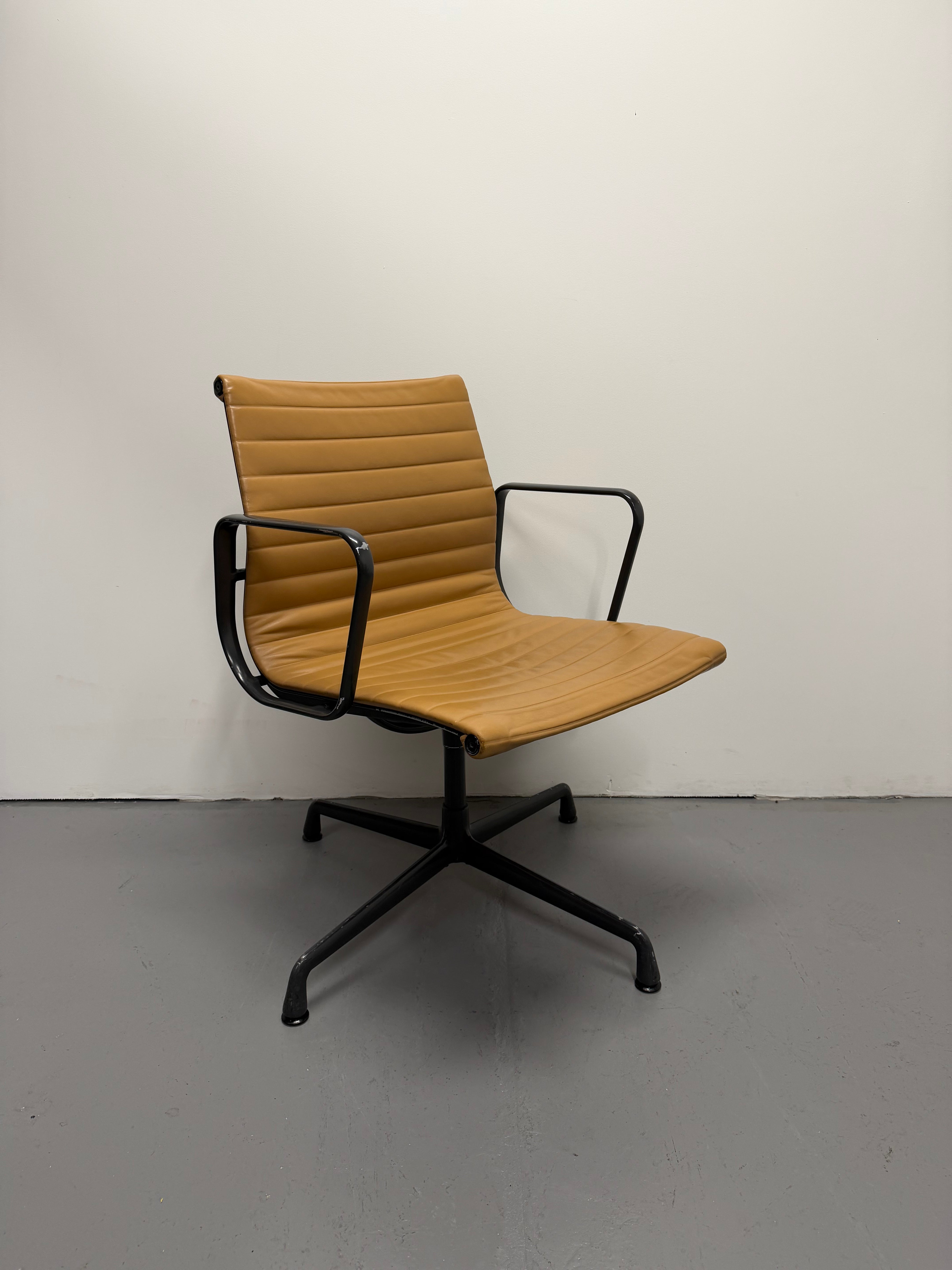 Eames Aluminium Group Low Back Chair - Tan Leather / Black Frame