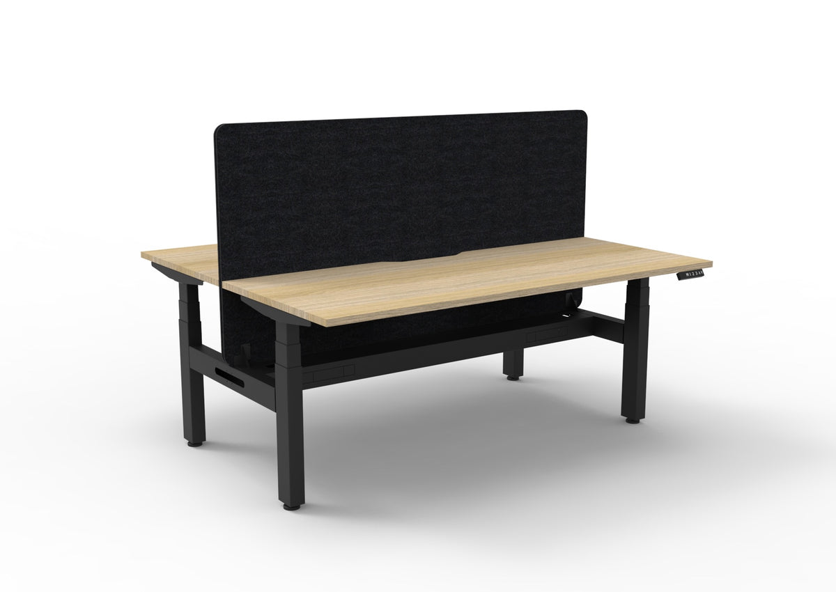 Back-to-back sit-stand workstation with cable tray and black Eco Panel screen, oak and black