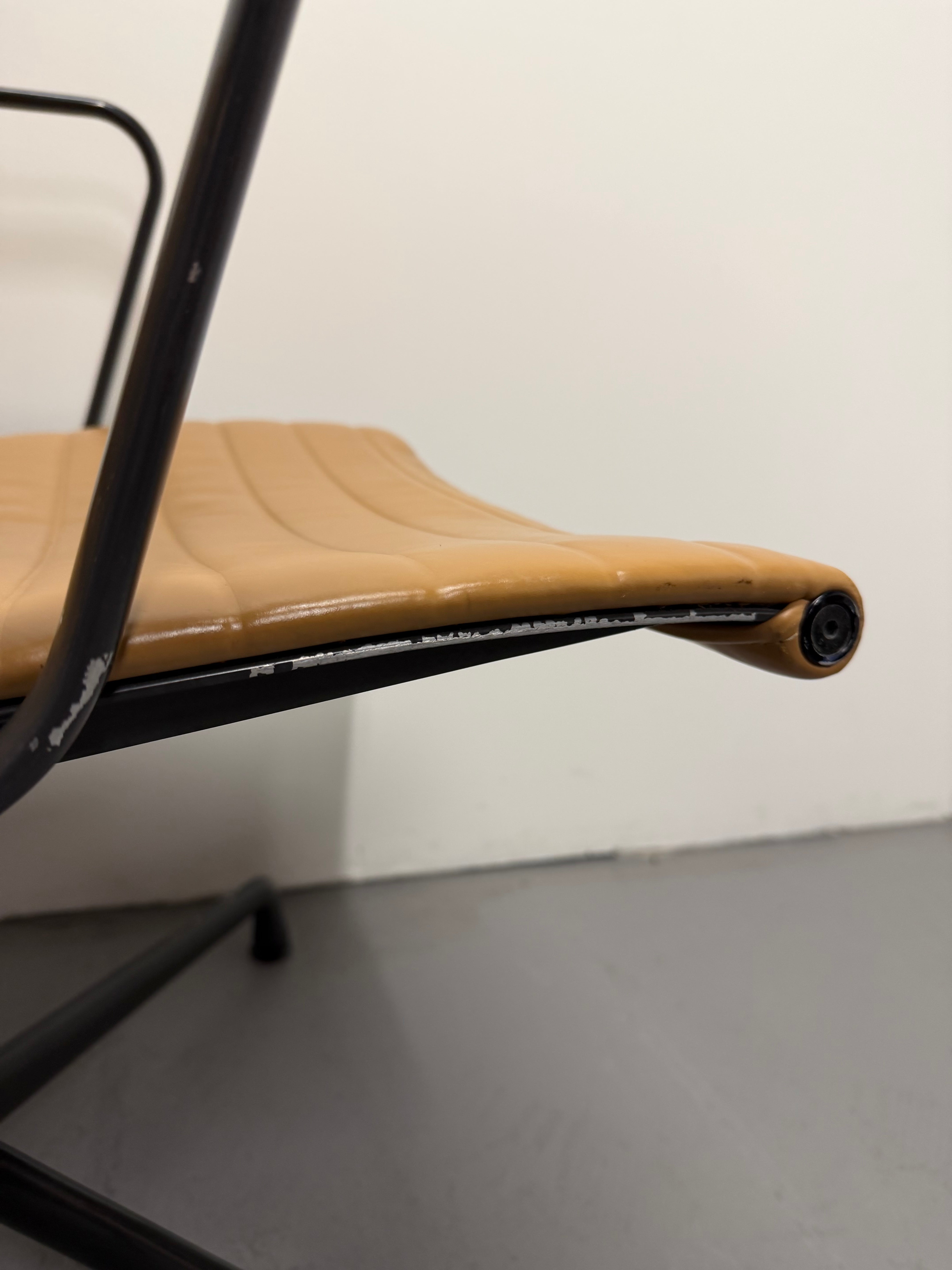 Eames Aluminium Group Low Back Chair - Tan Leather / Black Frame