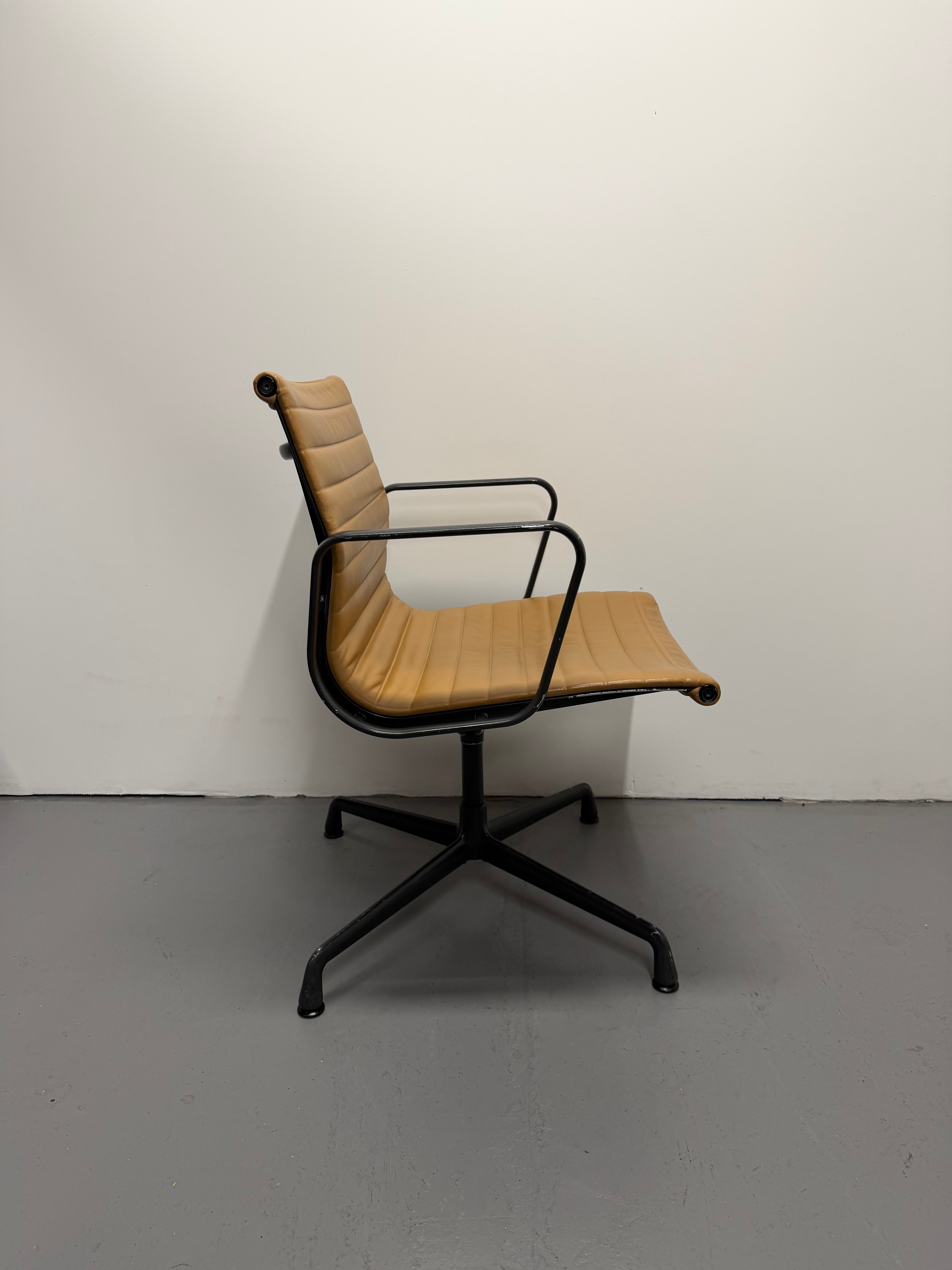 Eames Aluminium Group Low Back Chair - Tan Leather / Black Frame
