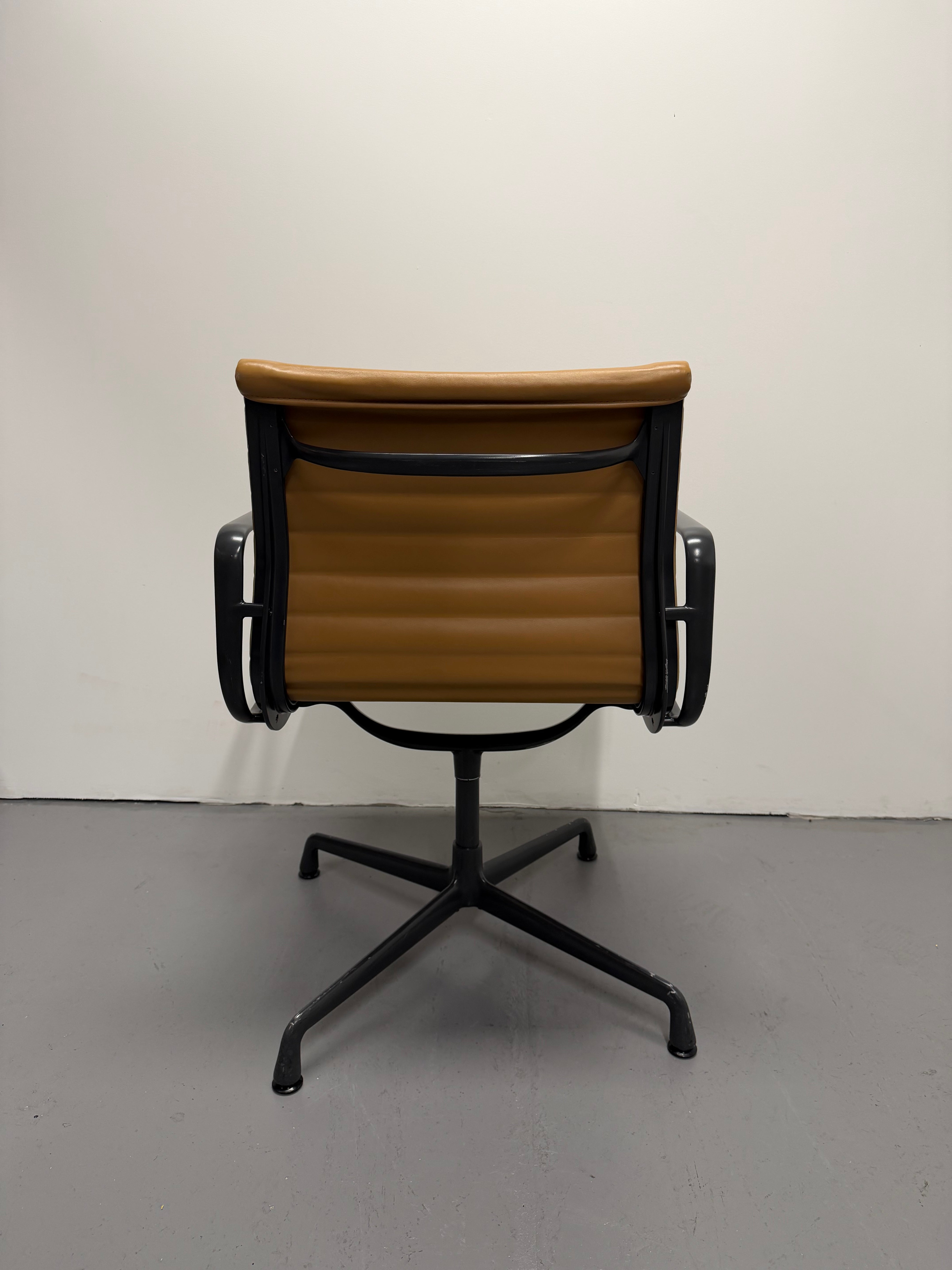 Eames Aluminium Group Low Back Chair - Tan Leather / Black Frame