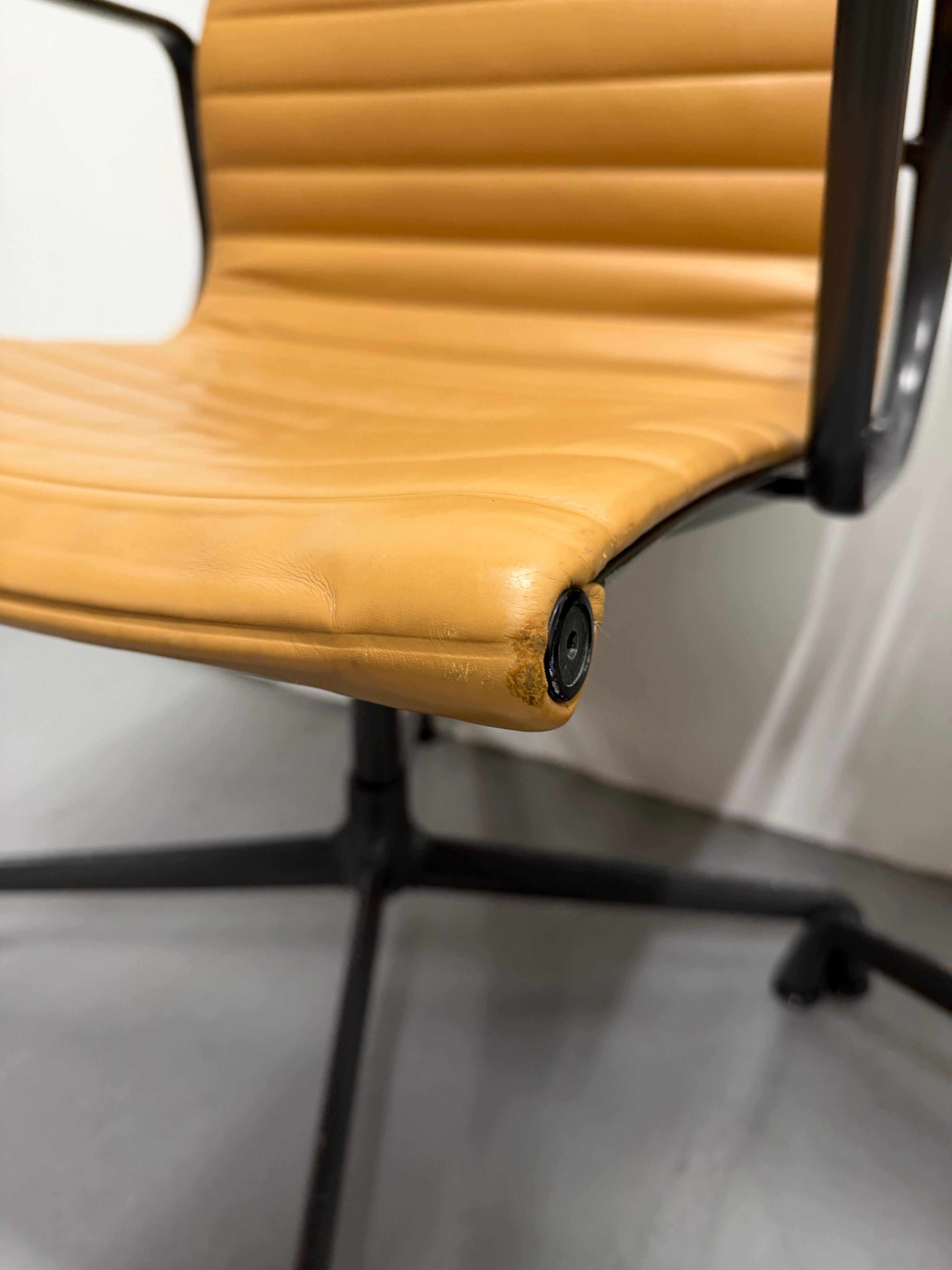Eames Aluminium Group Low Back Chair - Tan Leather / Black Frame