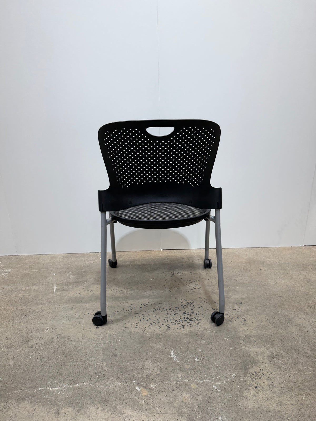 Herman Miller Caper Stacking Chair – Black, FLEXNET Seat, Castors, No Arms – view 6 – pre-owned