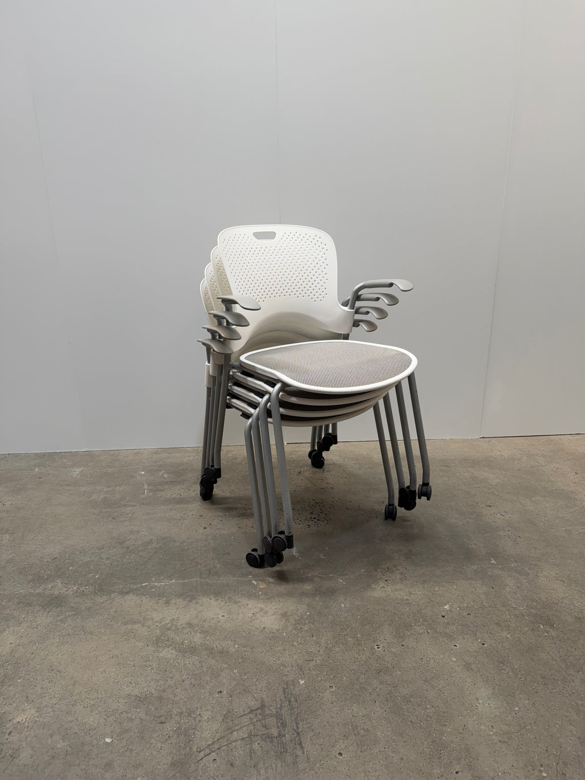 Herman Miller Caper Stacking Chair – White, FLEXNET Seat, Arms & Castors – view 9 – pre-owned