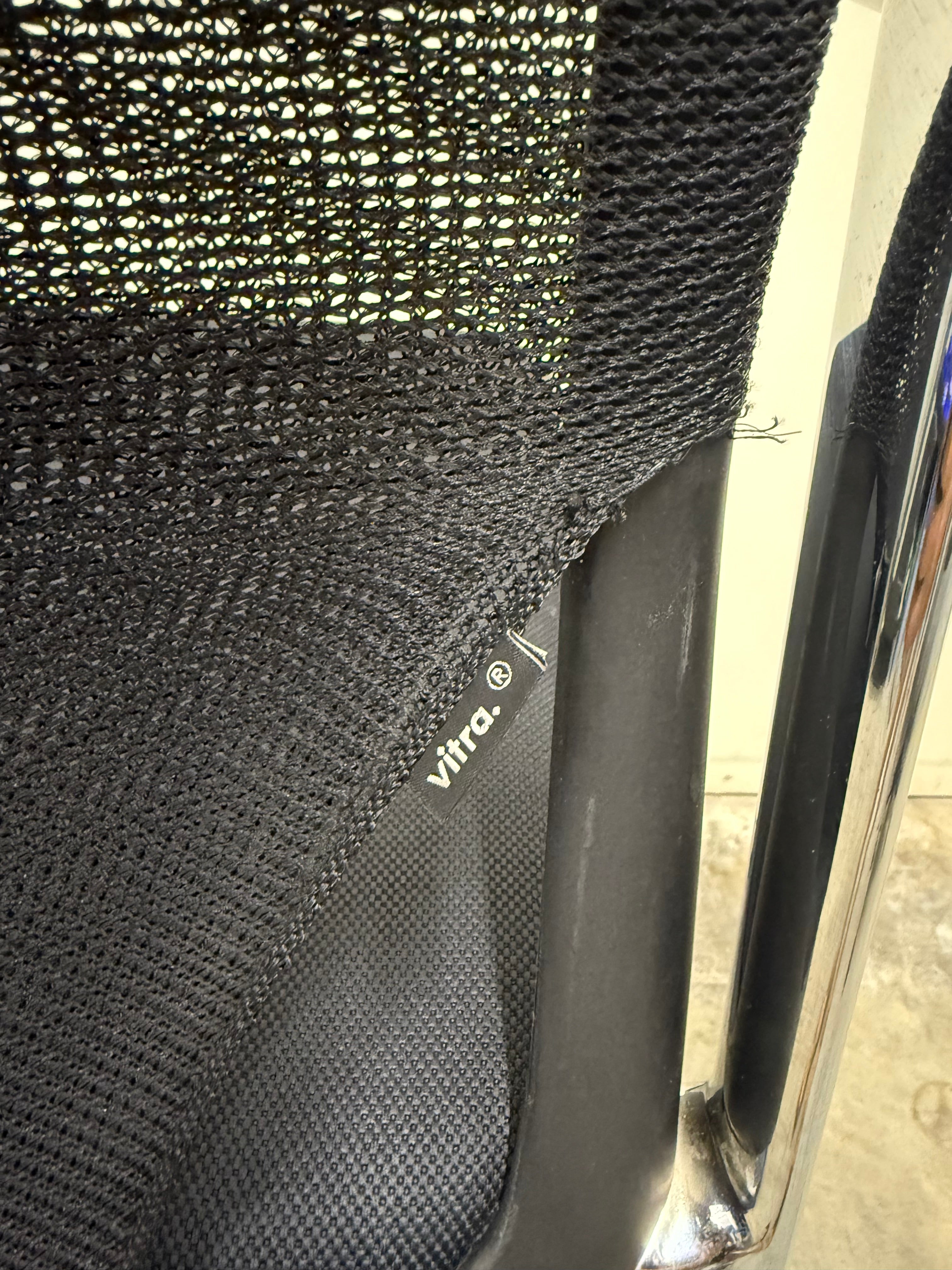 Vitra MedaSlim Chair – Black Mesh Back with Chrome Armrests