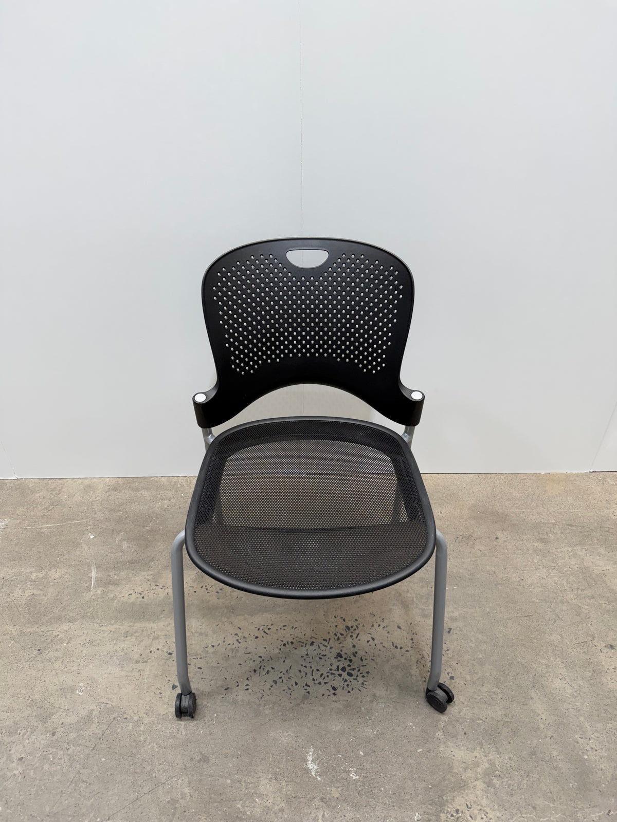 Herman Miller Caper Stacking Chair – Black, FLEXNET Seat, Castors, No Arms – view 4 – pre-owned
