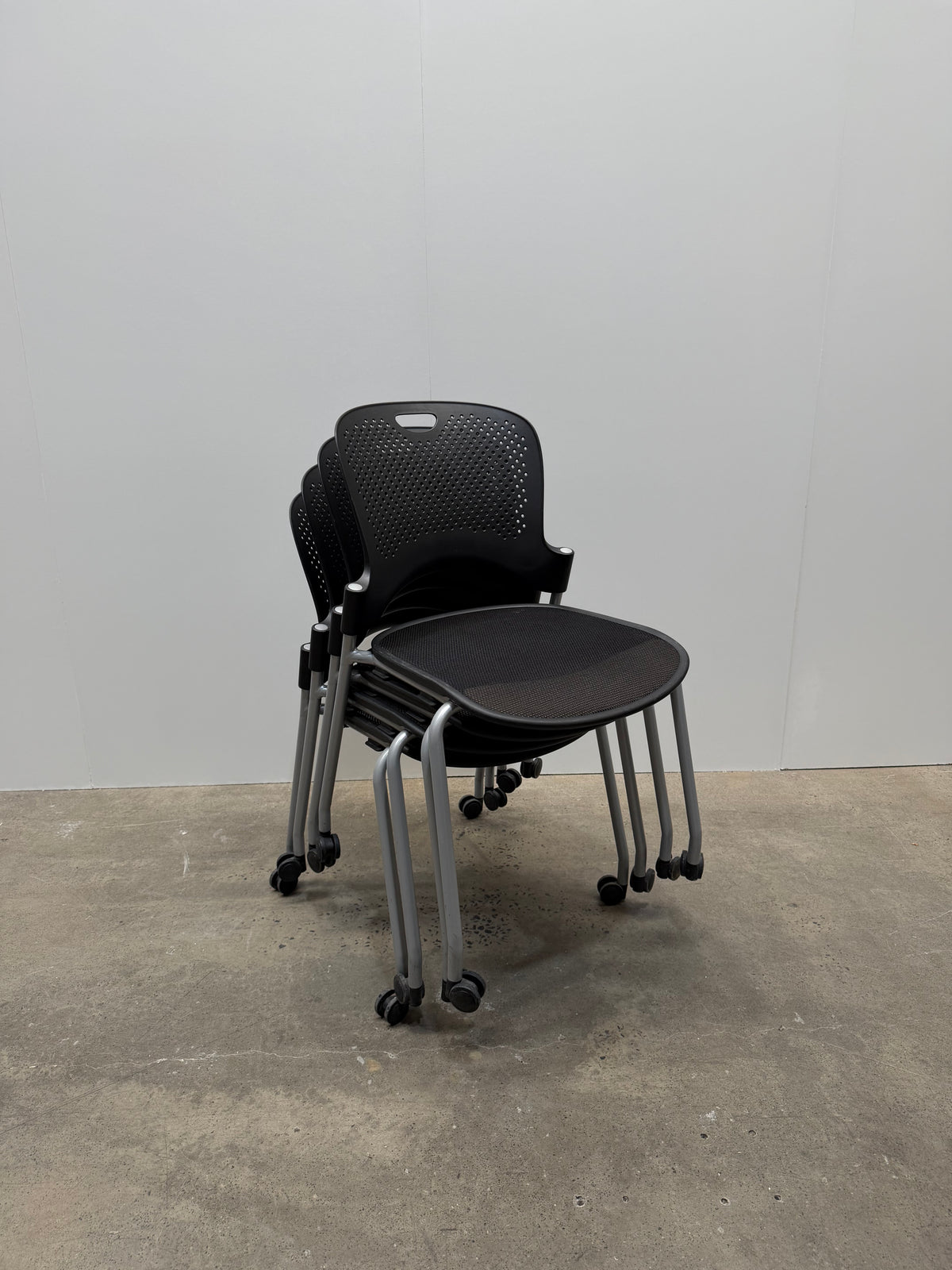 Herman Miller Caper Stacking Chair – Black, FLEXNET Seat, Castors, No Arms – view 2 – pre-owned