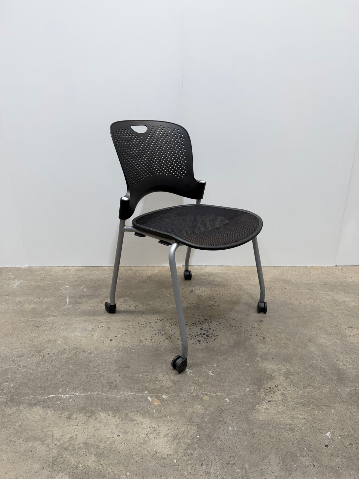 Herman Miller Caper Stacking Chair – Black, FLEXNET Seat, Castors, No Arms – view 7 – pre-owned