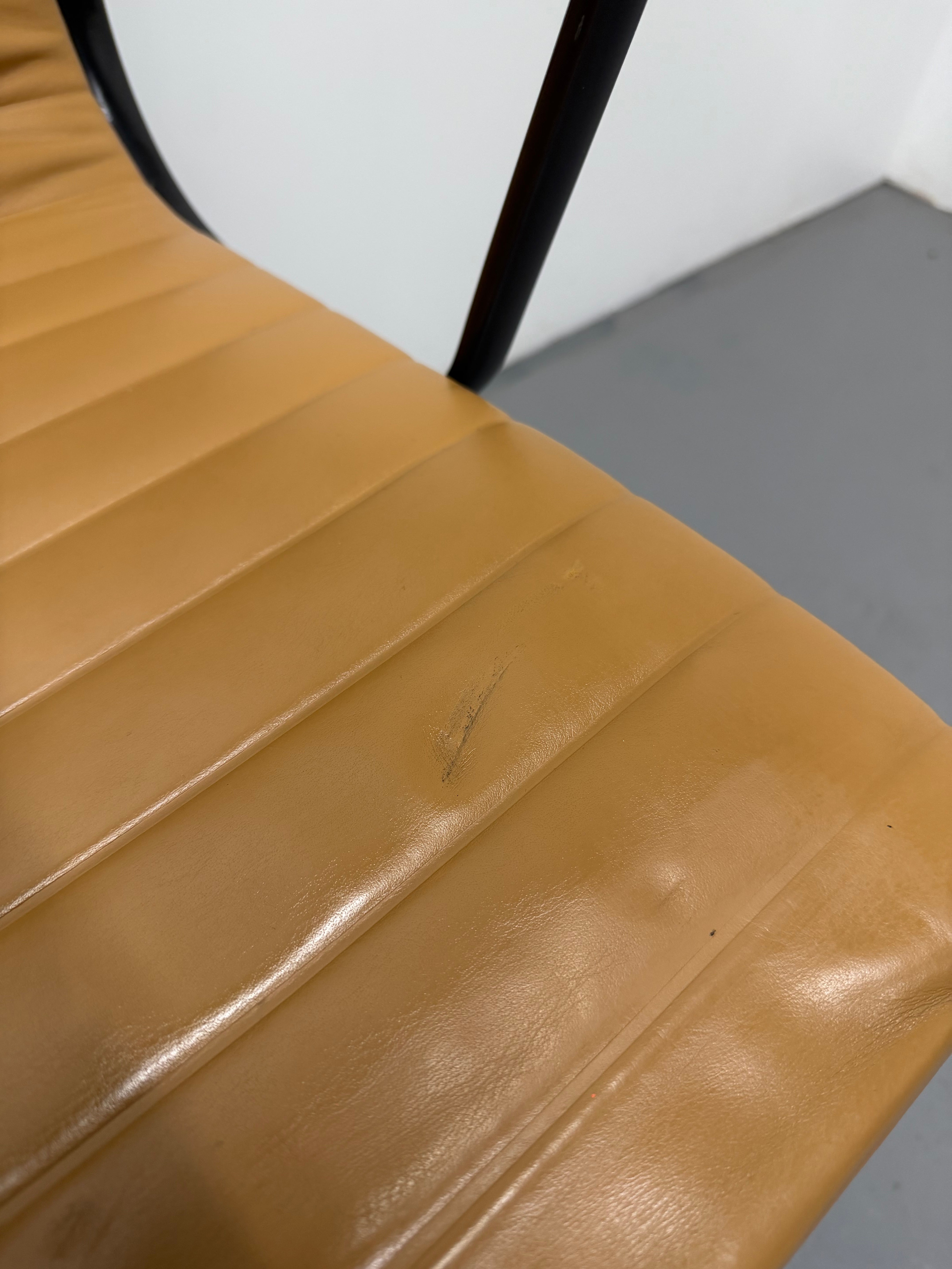 Eames Aluminium Group Low Back Chair - Tan Leather / Black Frame
