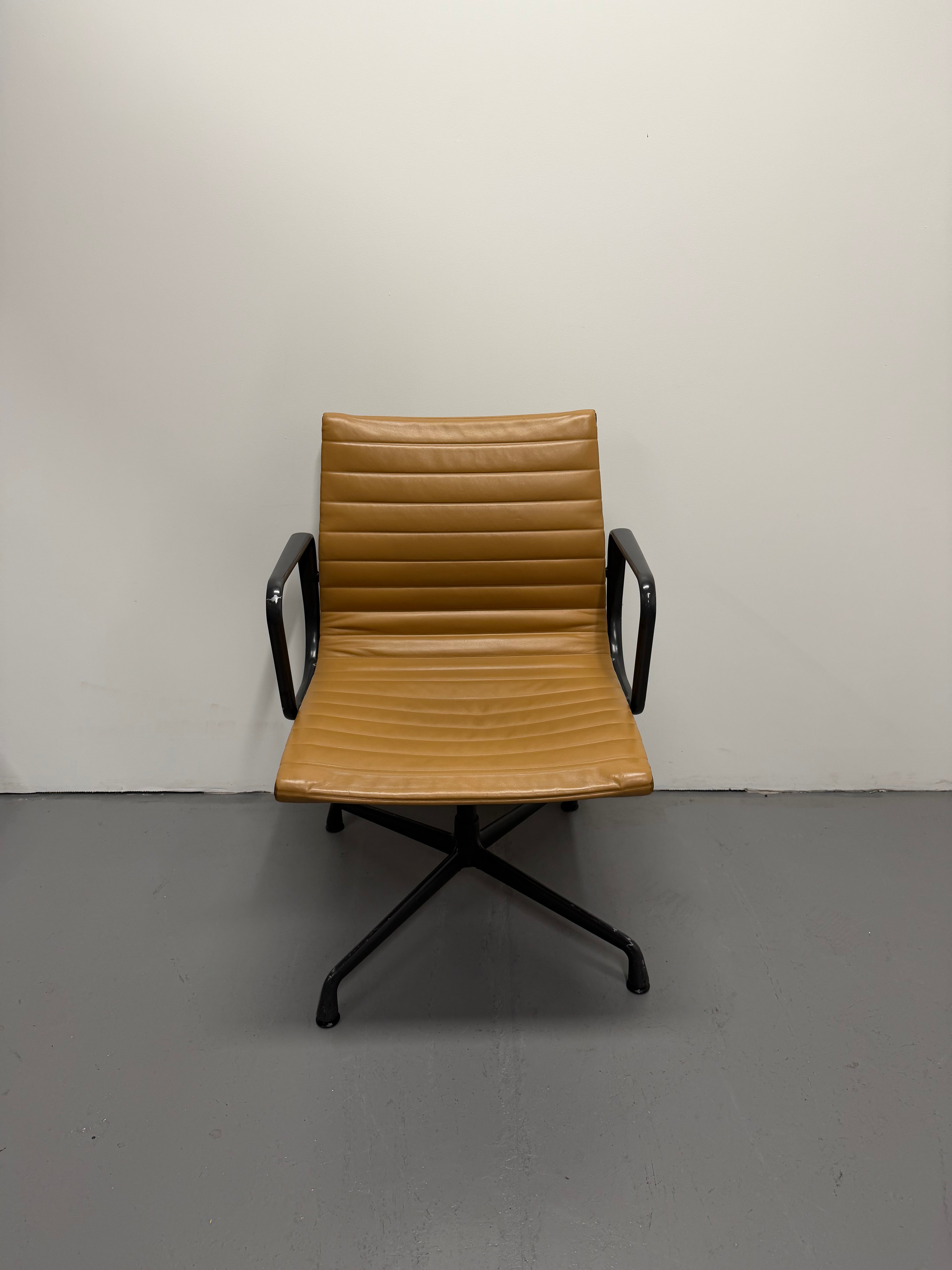 Eames Aluminium Group Low Back Chair - Tan Leather / Black Frame