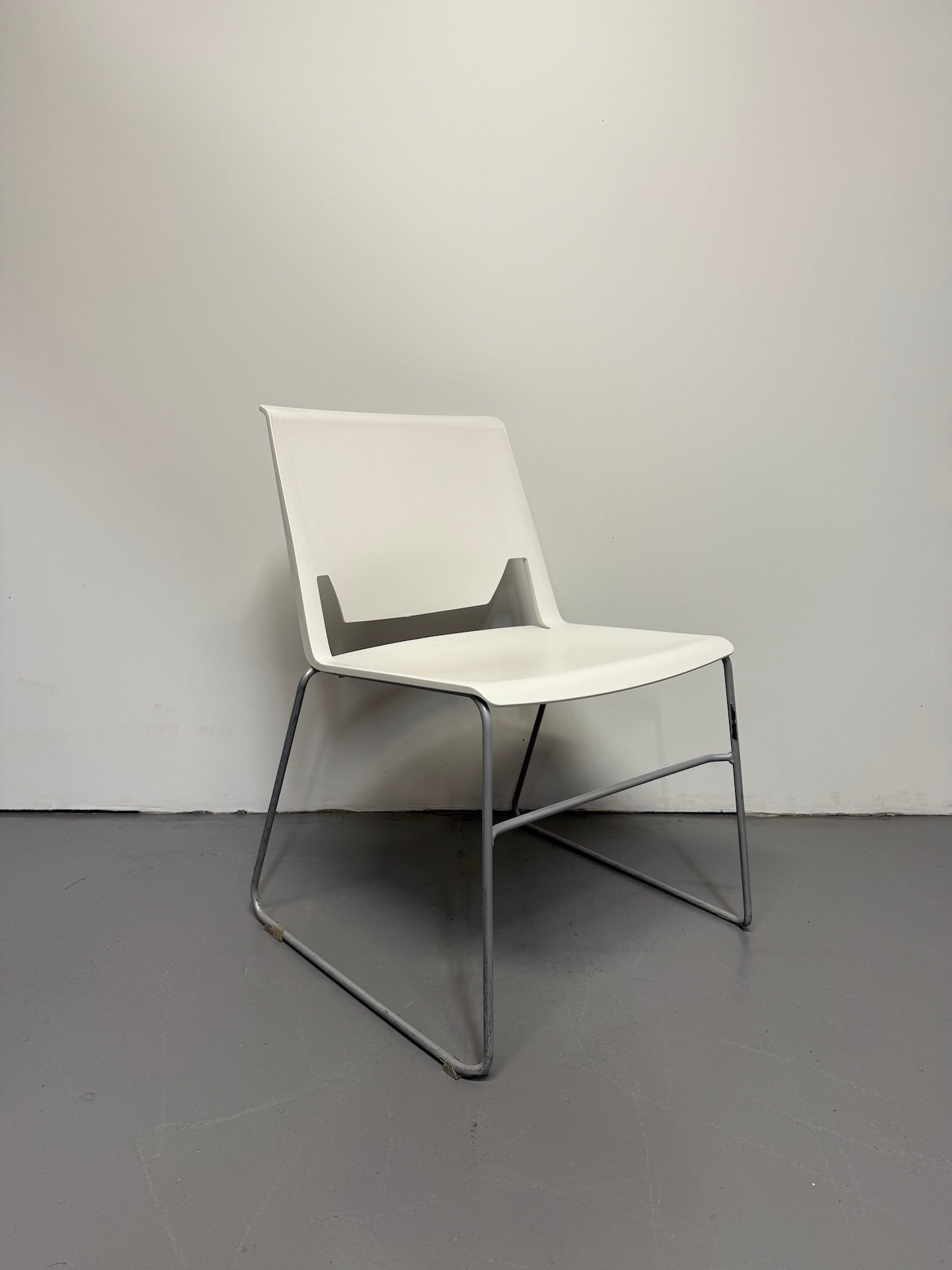 Haworth Very Sled Chair – White Seat with Metallic Silver – Stackable